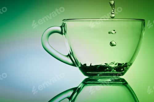 Preview: Drop of water falling down to cup of tea