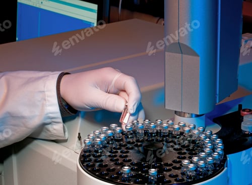 Preview: Scientist analyzing samples in a laboratory setting