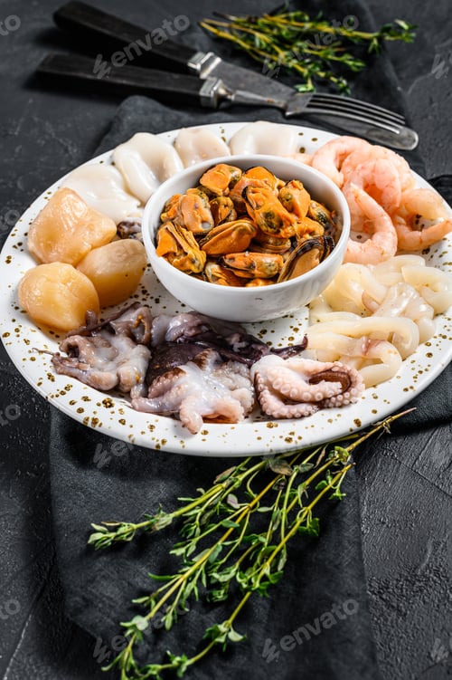 Preview: Steamed seafood mix, sea cocktail. Black background. Top view