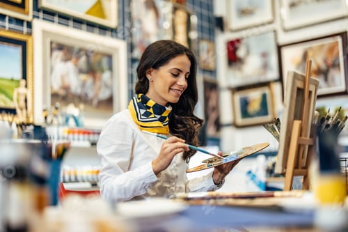 Preview: Adult woman, getting ready to finish drawing.