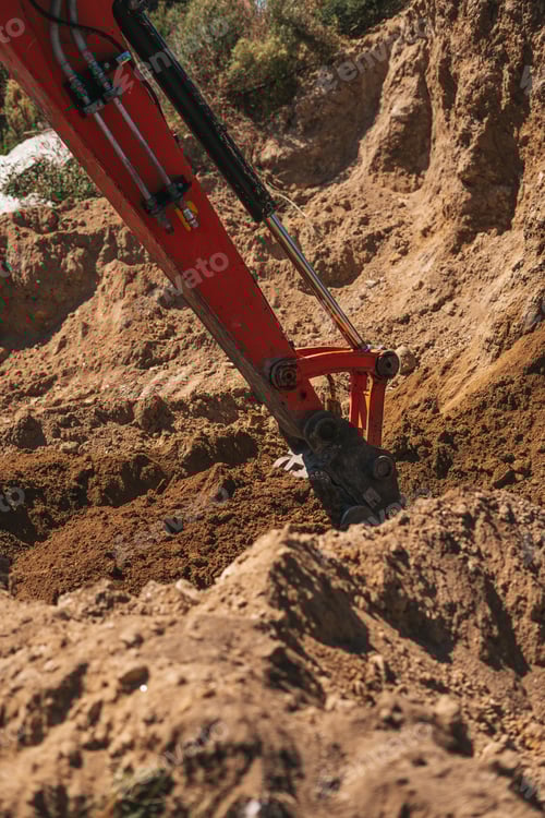 Preview: Excavator shovel digging on dirt