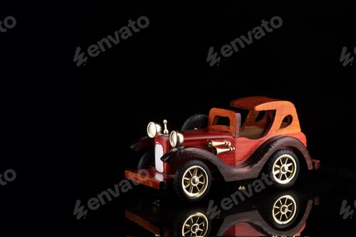 Preview: Vintage collectible automobile isolated on black background. Miniature of auto model. Copy space