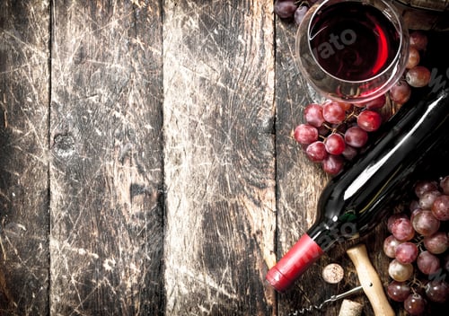 Preview: Wine background. Red wine with glasses with grapes.