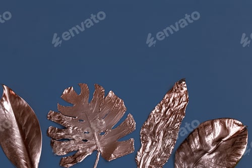 Preview: The background is painted with leaves of gold color on a blue background .