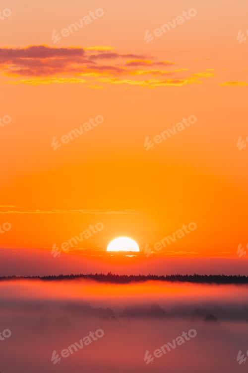Preview: Amazing Sunrise Over Misty Landscape. Scenic View Of Foggy Morni