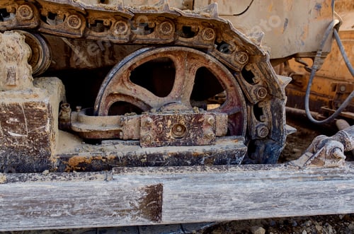Preview: yellow excavator with a steering wheel digging out the ground summer sand truck