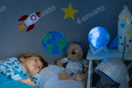 Preview: Happy child sleeping at home