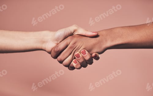 Preview: Lets do it together. Shot of two unrecognizable women shaking hands.