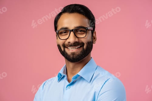 Preview: Handsome, successful Indian man, businessman wearing stylish eyeglasses, looking at camera