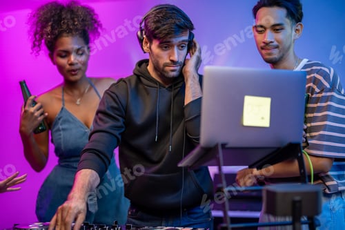 Preview: Caucasian young man artist DJ mixing and scratching music mixer controller.