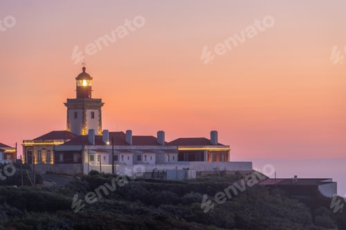 Preview: Cabo Da Roca Lighthouse in Portugal at Evening Twilight