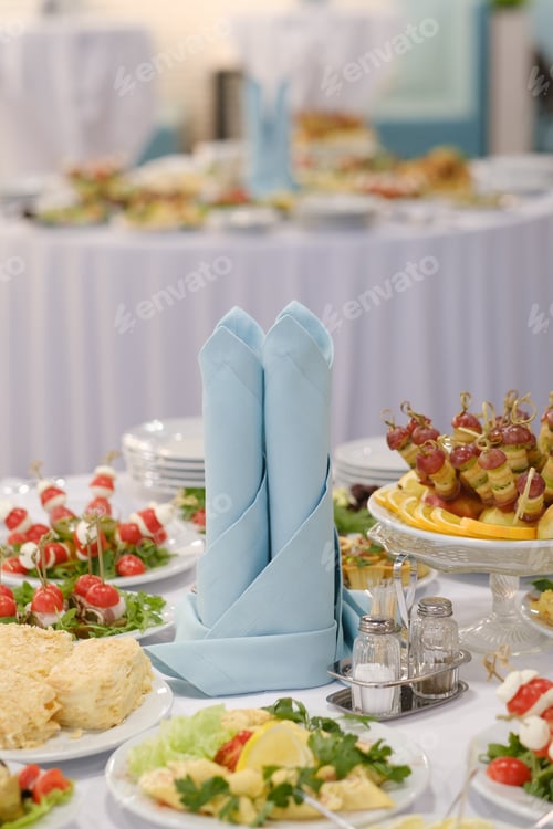 Preview: Elegant buffet arrangement featuring colorful dishes and garnishes at a festive event