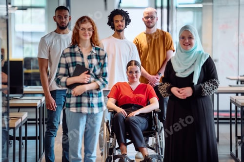 Preview: A diverse group of young business people walking a corridor in the glass-enclosed office of a modern