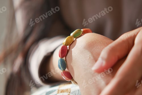 Preview: Colorful bracelet worn on the wrist in bright sunlight