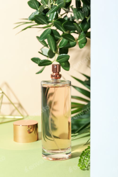 Preview: Concept of perfume on multicolor background, blank bottle with space for text