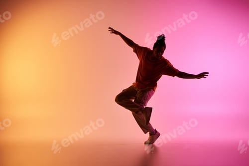 Preview: Young dancer moves on gradient background