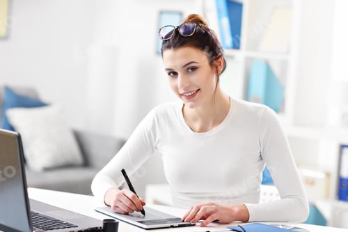 Preview: Woman working in her home office