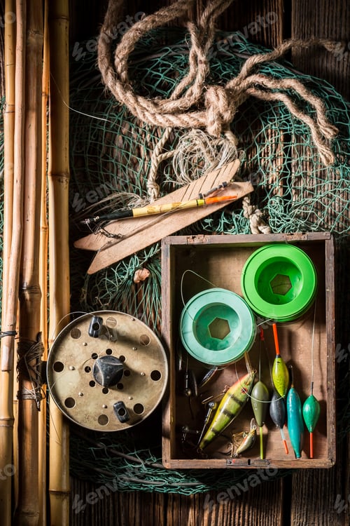 Preview: Vintage angler equipment with net, rods and floats