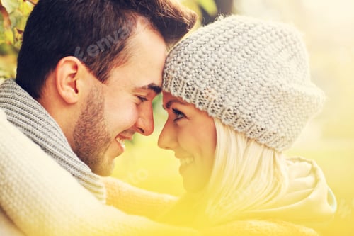 Preview: Young lovely couple in the park in autumn