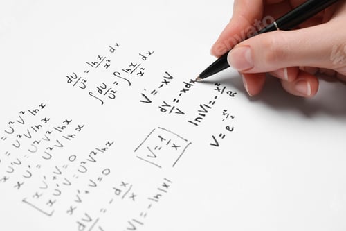 Preview: Student writing different mathematical formulas on paper, closeup
