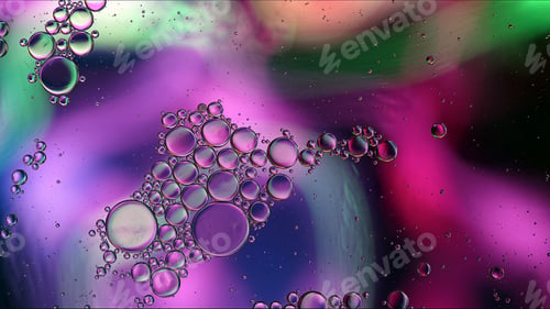 Preview: Abstract Colorful Food Oil Drops Bubbles and spheres Flowing on Water Surface