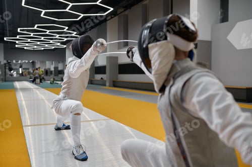 Preview: Duel of fencers during fencing match, training lesson at martial art class