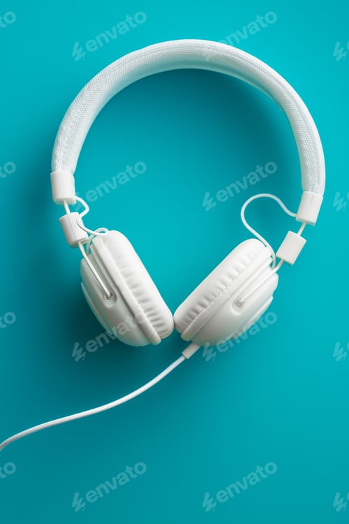 Preview: White vintage headphones.