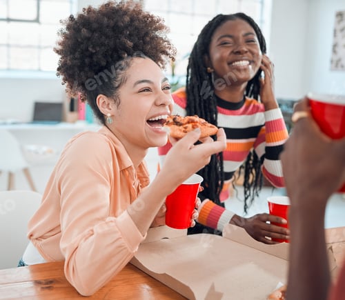 Preview: Young cheerful mixed race businesswoman eating lunch with hr colleagues at work. Group of joyful co
