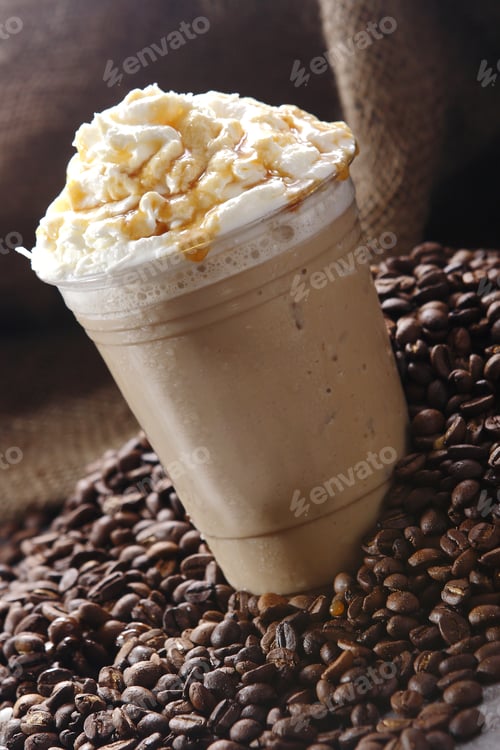 Preview: Delicious frappuccino with whipped cream and caramel in the plastic cup