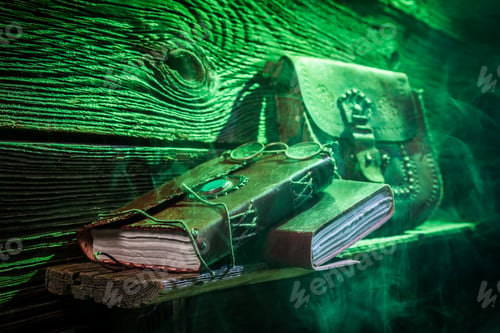 Preview: Shelf with scrolls and books with green light for Halloween