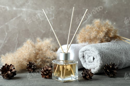 Preview: Diffuser and bath accessories on gray textured table