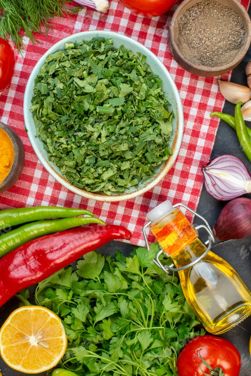 Preview: top view fresh greens with different vegetables on dark background meal lunch snack colors salad