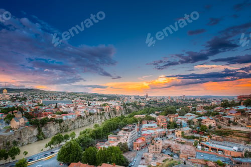 Preview: Tbilisi, Georgia. Evening Top View Of City At Colorful Sunset. C