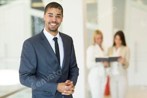 Preview: Young multiracial people working in the office