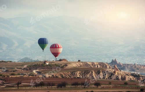 Preview: Colorful hot air balloons flying over Red valley at Cappadocia,