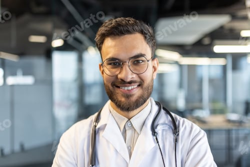 Preview: Confident male doctor in modern medical office wearing a lab coat and stethoscope, emphasizing