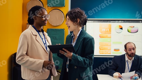 Preview: Project manager sharing insight about a new strategy with the new employee