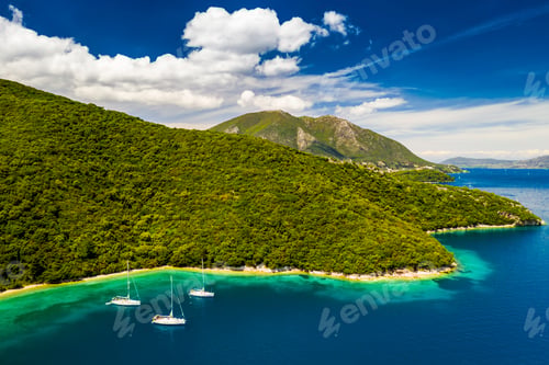 Preview: Yachts in the bay near the green island. Summer vacation, Greece, Kefalonia