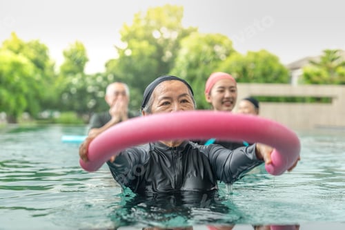 Preview: An engaging aquatic exercise class for seniors led by an instructor in a pool.