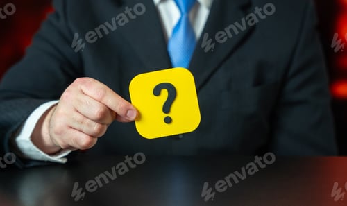 Preview: A businessman holds a question mark in his hands. Looking for an answer. Search and analysis