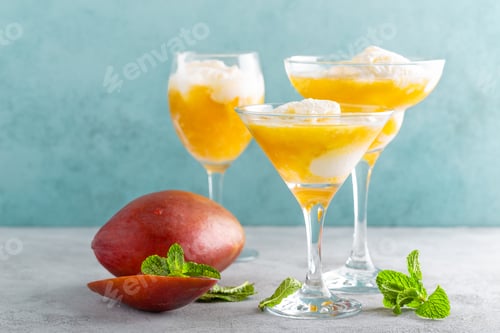 Preview: Refreshing summer mango cocktail with fresh juice and ice cream