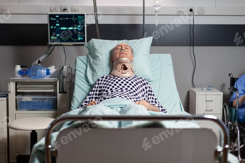 Preview: Hospitalized senior laying unconscious in hospital room bed