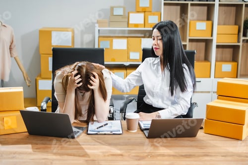 Preview: stressed and headache-ridden woman dealing with online sales losses.