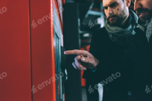 Preview: close up man hands buying ticket