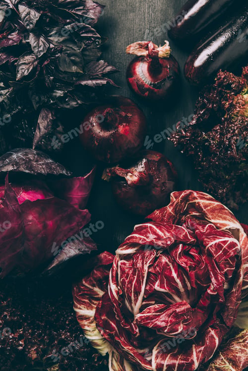 Preview: top view of red cabbage, salad and onions on grey dark table