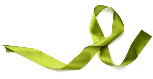 Preview: Rolled green silk ribbon on white background, gift wrapping decor