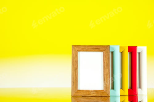 Preview: front view different picture frames with colored corners on yellow background family memory glass