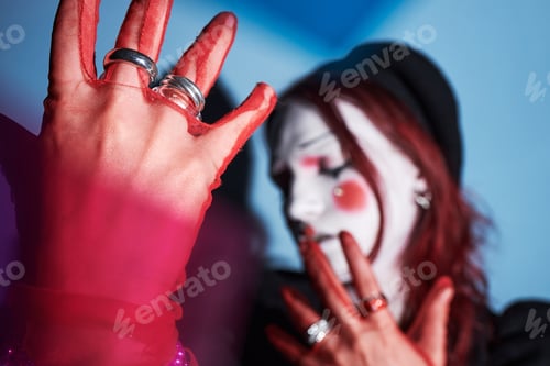 Preview: Caucasian Gen Z Girl Expressing Creativity with Dramatic Makeup at Home