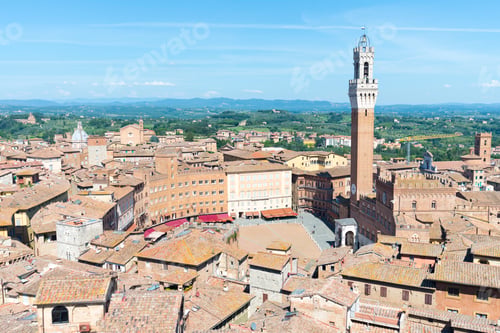 Preview: Cityscape view of rooftops and Torre del Mangia, Siena, Tuscany, Italy