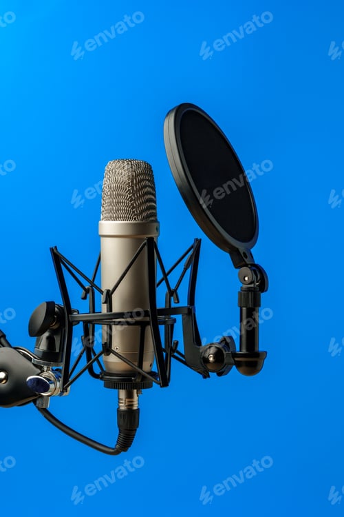Preview: Professional microphone stand over blue studio background